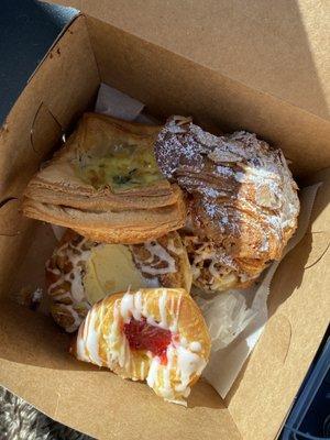 Lorraine quiche, raspberry pastry, custard pastry, chocolate almond croissant, pecan pastry!