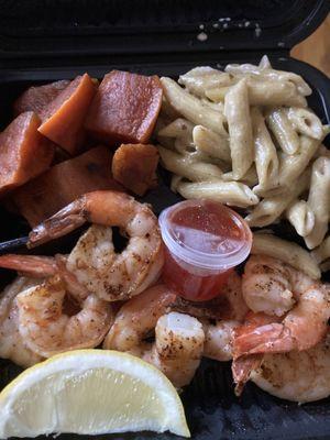 Sauteed shrimp with jerk pasta and candied yams