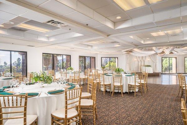 Banquet room with white and green styling