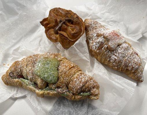 Pistachio and Strawberry croissant, Kouign Amman with Nutella, and Strawberry Croissant