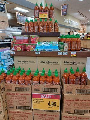 Huy Fong Sriracha Chili Sauce sale. $4.99 for 17 oz. $6.99 for 28 oz. Photo taken 2/21/2024.