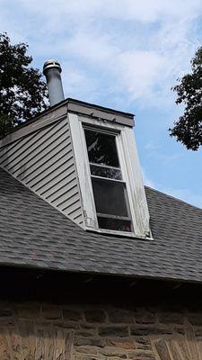 Did not include replacing trim on dormers. Left job like this.