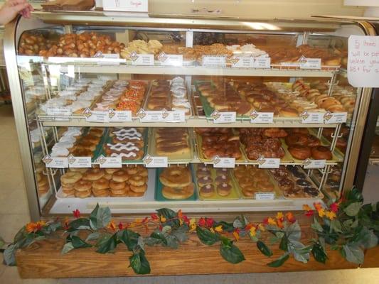 full show case and ready for customers...  best made from scratch donuts..