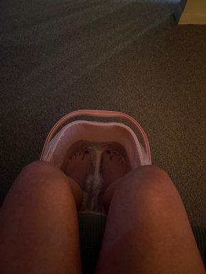 Foot soak prior to reflexology massage.  Not a pedicure, but that's not what reflexology is really about.