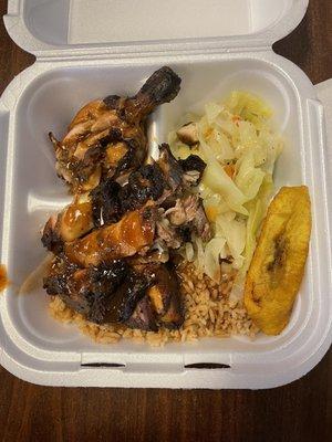 Jerk Chicken with Steam Vegetables and rice.