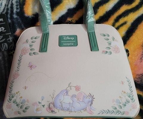 Back of the Winnie the pooh loungefly satchel.