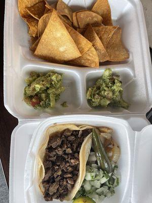 Carne asada taco and guacamole