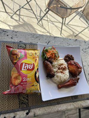 Gotta be back for my Sunday craving ! The rice combo with fried chicken & pork sausage plus the lays chips Thai flavor are so good