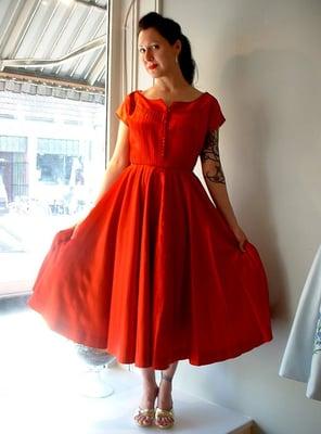 Yvette Models a 50's Satin party dress.