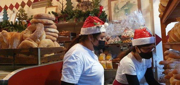 employees serving fresh loaves