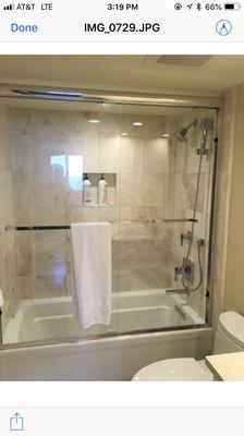 Frameless tub unit also comes in shower height.