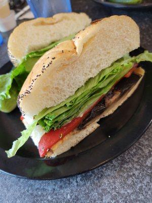 Portobello sandwich - hardroll, lettuce, swiss, red peppers.