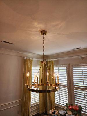 Dining Room Chandelier Installation by Walker Electric. Call our office today for an estimate.