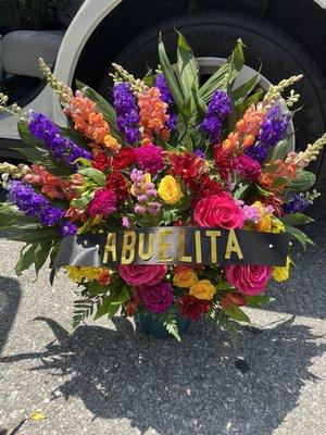 Flowers arrived 20 minutes late (in middle of funeral) , letter "U" is smaller than others and there was no card attached