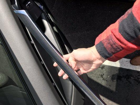 Ephraim broke my carbon fiber trim trying to remove the door panel.