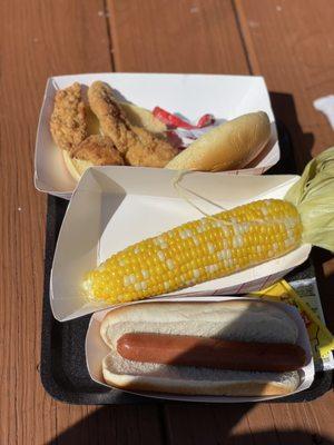 Hot dog, roasted corn (amazing), and the saddest "chicken sandwich" 2 skinny tenders between hamburger buns.