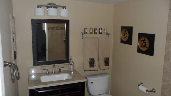 Bathroom new paint, vanity and lighting