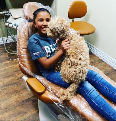 Our Therapy Dog, Nilla, and Ms. Michaela Enjoying Time Together Before a Teeth Cleaning!!