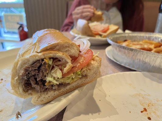 Our beef cheesesteak hoagies and pizza fries