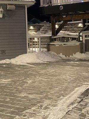 This is how they shovel the deck.  There is snow like this all the way around.