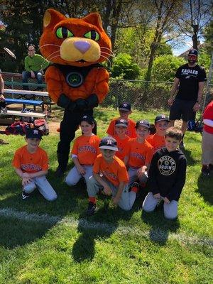 Caddie with little leaguers in Connecticut.