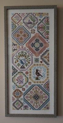 Framed cross-stitch