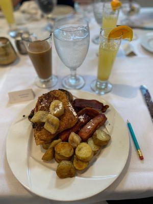 French toast, bacon, and potatoes