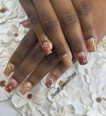 Golden brown goddess nails by Nikki