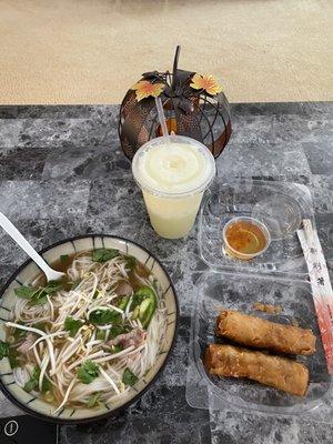 Vietnamese spring rolls, pho with eye-of-round steak and well done brisket, and a pineapple smoothie.