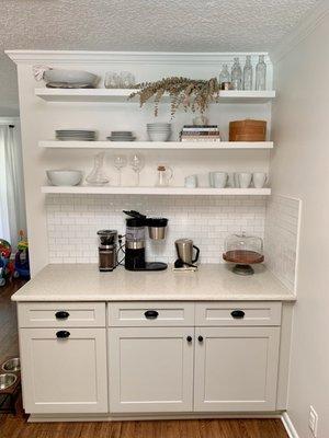 Other side of the kitchen. They removed all cabinets&shelves. Adding in only open shelves above to help open up the space. We love it!