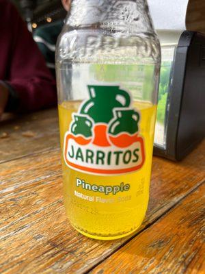 Jarritos Pineapple with Pastorito tacos