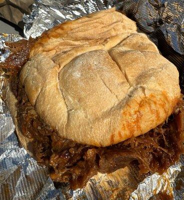 Pulled pork sandwich! Moist, delicious and big enough for two! Roll was great too! Not a potato roll. Just a plain roll, just right.