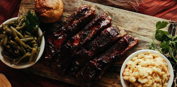 Barbecue Pork Ribs with Mac and Cheese, String Beans and Corn bread.