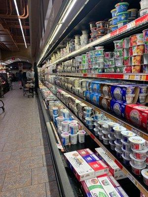 Fully stocked yogurt section.