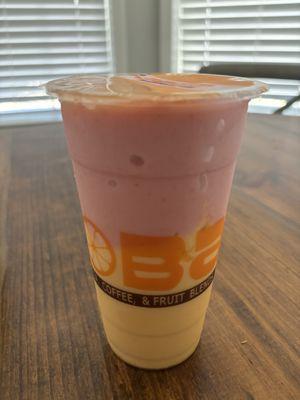 Half strawberry and half mango smoothie