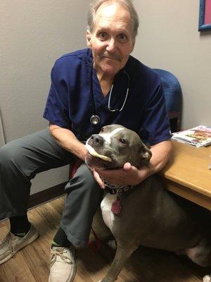 Dr. Rick with Tootsie. She has a super shiny coat and is very happy!