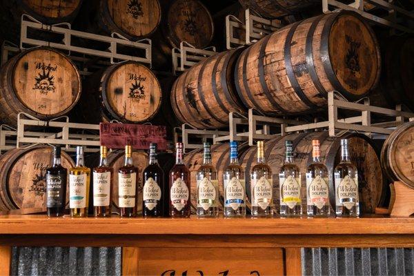 Line up of Wicked Dolphin Rum in Barrel Room