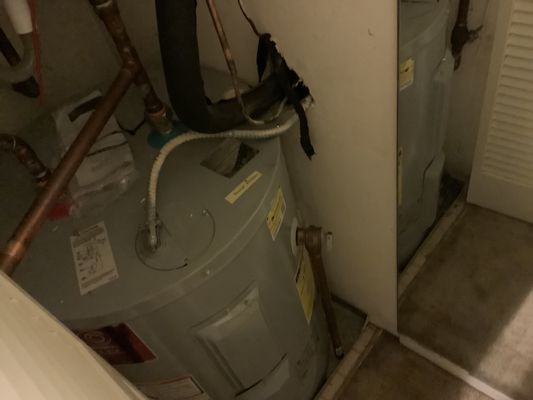 30-gallon water heater runs like new with annual flushing from Michael & Son.