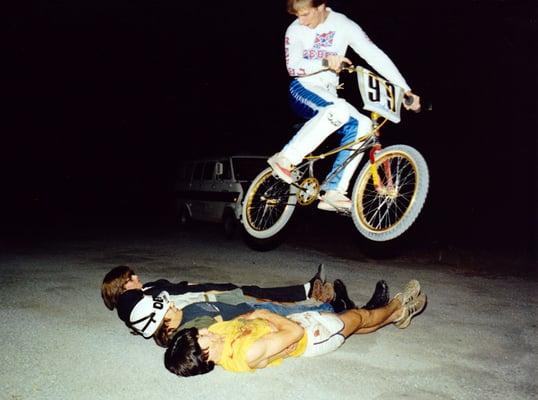 Mike Skiles, classic BMX bunnyhop over a passel of O.G. CHA 80's mullets. Bloody Ramones! Look at the damage they done! Whos Rokn Bluchers?