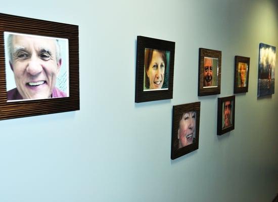 wall of excellent smiles created by Tysons Dental Associates