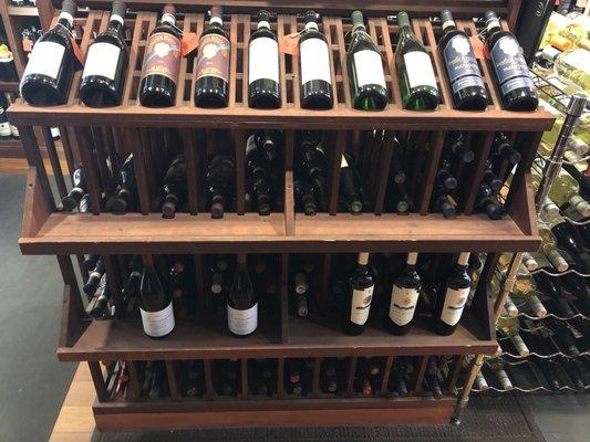 The wine is elegantly displayed around the store.