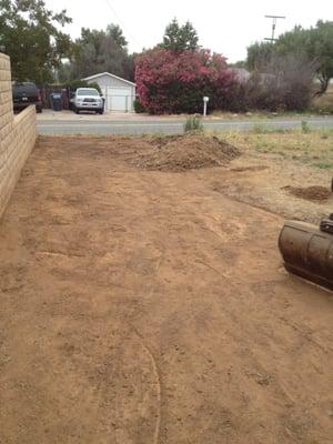 Yard scraping to put down new topsoil.