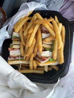 Club sandwich with fries