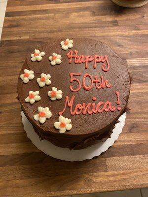 Super cute 6 in chocolate cake with chocolate frosting.