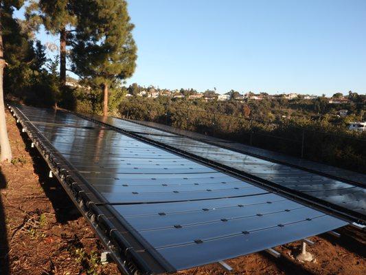 SwimLux Ground Mount Solar Pool Heating Installation by SolarTech