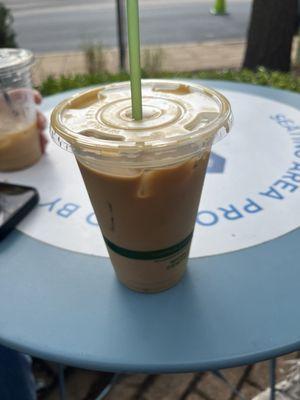 Iced vanilla latte with oatmilk