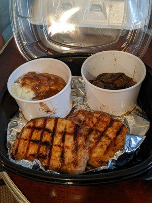 Grilled Pork Chops, $14.99 prior to tax. Sides chosen shown with mashed potatoes and gravy, sauteed mushrooms