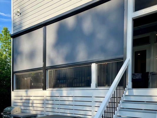 Exterior motorized solar shades effectively filter and diffuse sunlight, block out harmful rays, and keep your space cooler.