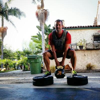 Kettlebell squats, getting deep. #personaltraining #grouptraining #venice #marinadelrey #marvista #culver