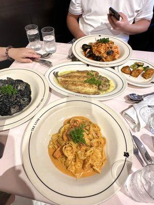 Risotto (left), Linguine del Marinaio (top), Trout Pesto Butter + Side Potatoes (middle), Fettuccine Mare E Monti (bottom)